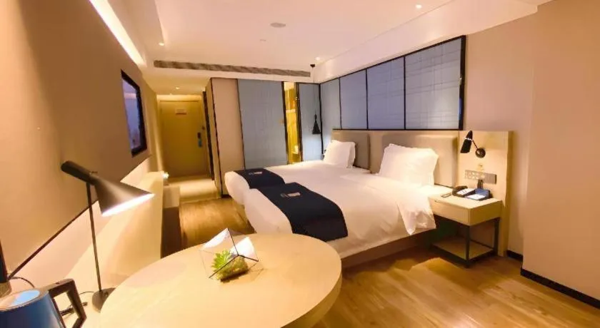 Bed in Echarm Hotel Shenzhen World Exhibition and Convention Center