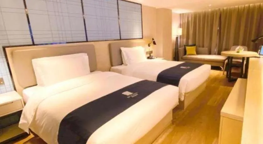 Bed in Echarm Hotel Shenzhen World Exhibition and Convention Center