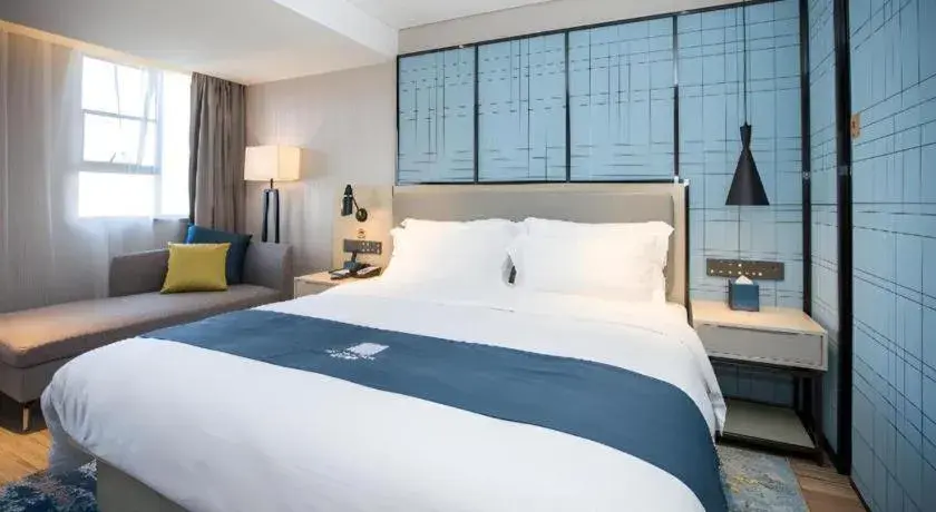 Bed in Echarm Hotel Shenzhen World Exhibition and Convention Center Bed in Echarm Hotel Shenzhen World Exhibition and Convention Center