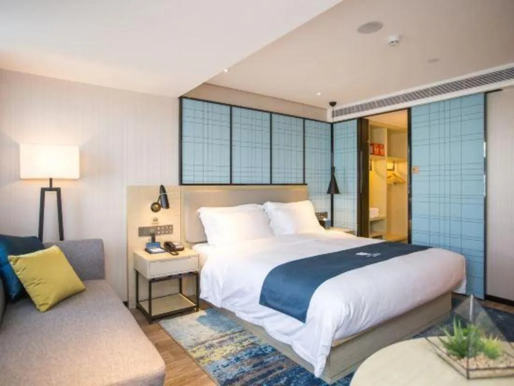 Bed in Echarm Hotel Shenzhen World Exhibition and Convention Center