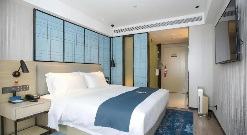 Bed in Echarm Hotel Shenzhen World Exhibition and Convention Center