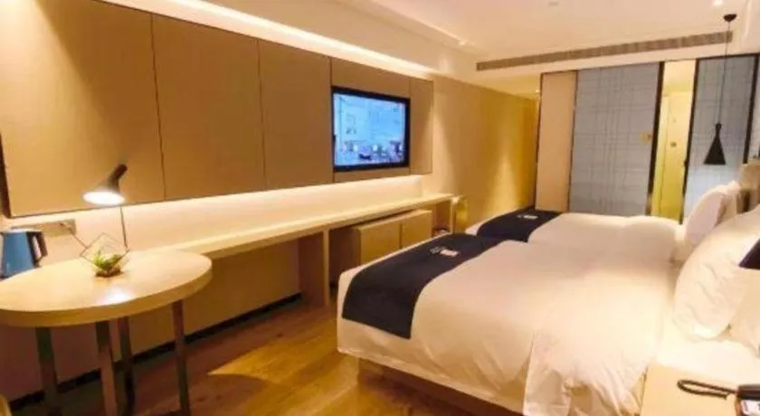 Bed in Echarm Hotel Shenzhen World Exhibition and Convention Center