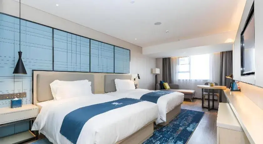 Bed in Echarm Hotel Shenzhen World Exhibition and Convention Center Bed in Echarm Hotel Shenzhen World Exhibition and Convention Center