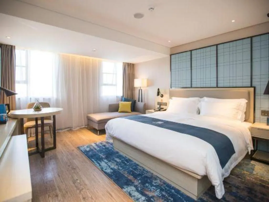 Bed in Echarm Hotel Shenzhen World Exhibition and Convention Center