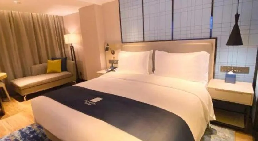 Bed in Echarm Hotel Shenzhen World Exhibition and Convention Center