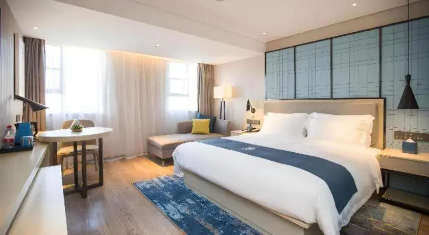 Bed in Echarm Hotel Shenzhen World Exhibition and Convention Center Bed in Echarm Hotel Shenzhen World Exhibition and Convention Center