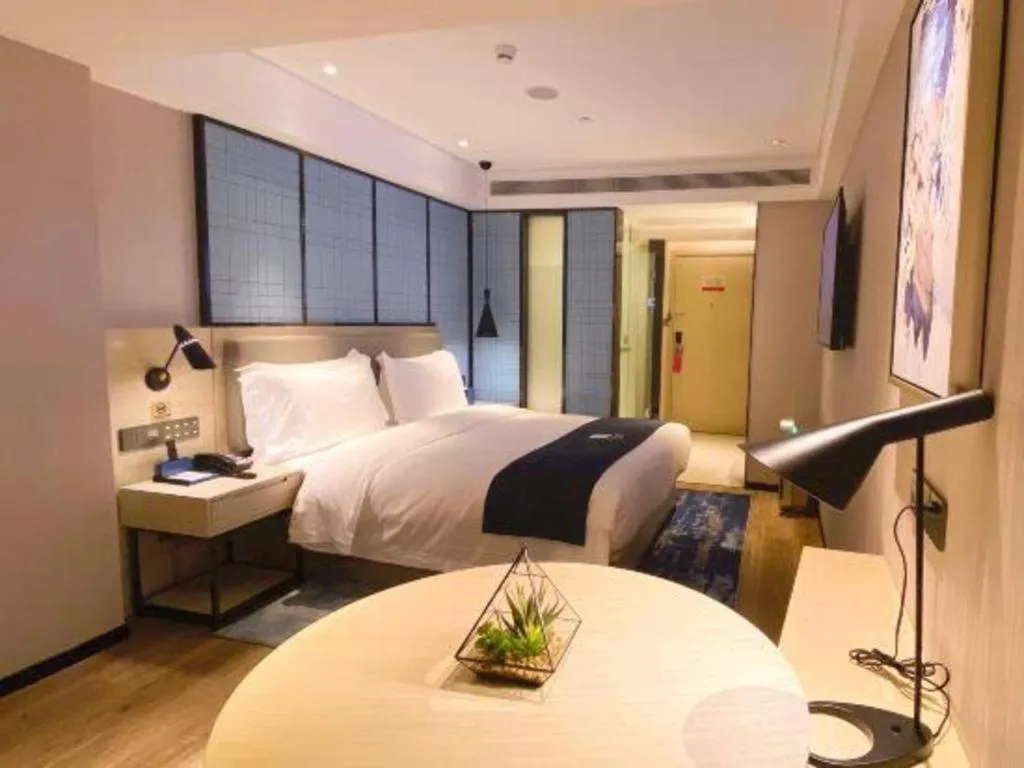 Bed in Echarm Hotel Shenzhen World Exhibition and Convention Center