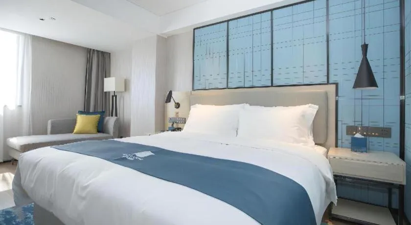 Bed in Echarm Hotel Shenzhen World Exhibition and Convention Center