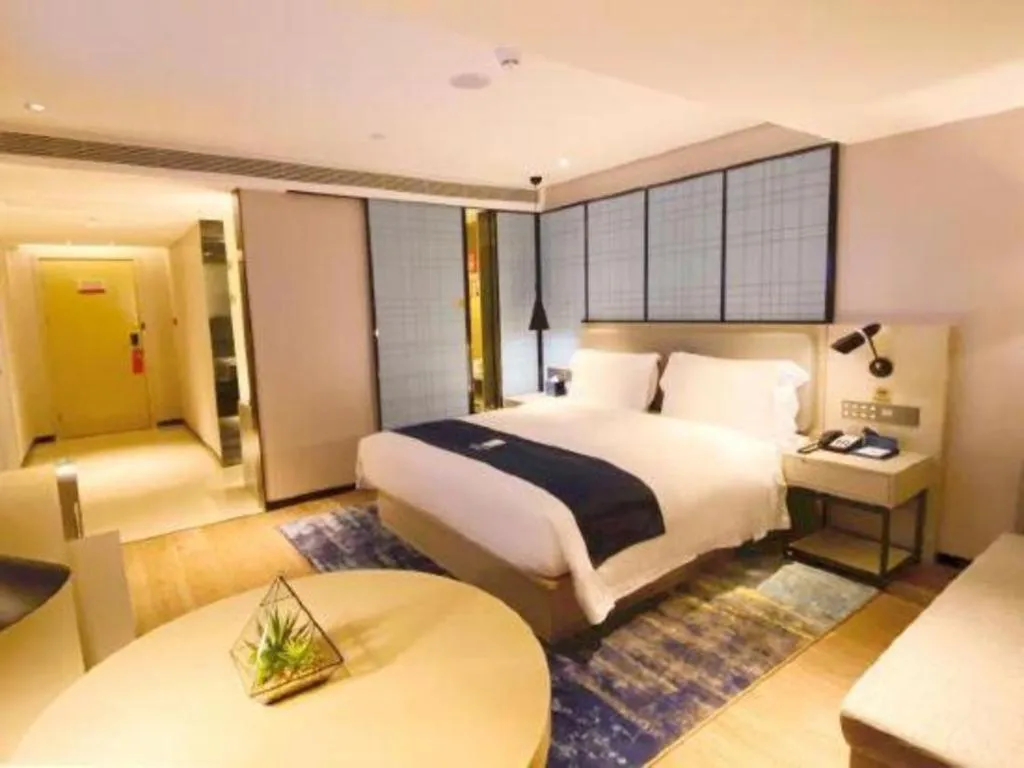 Bed in Echarm Hotel Shenzhen World Exhibition and Convention Center