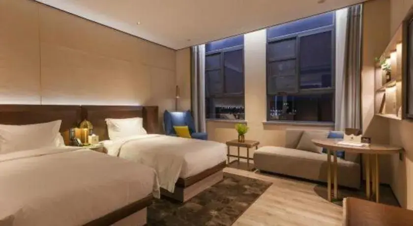 Bed in Echarm Plus Hotel Wuhan Wenhua Boulevard Dahualing Subway Statiom Bed in Echarm Plus Hotel Wuhan Wenhua Boulevard Dahualing Subway Statiom