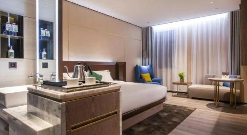 Bed in Echarm Plus Hotel Wuhan Wenhua Boulevard Dahualing Subway Statiom