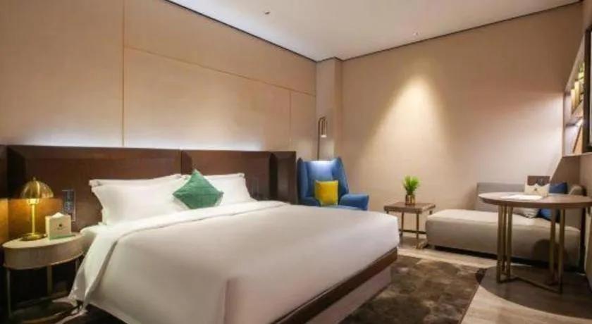 Bed in Echarm Plus Hotel Wuhan Wenhua Boulevard Dahualing Subway Statiom