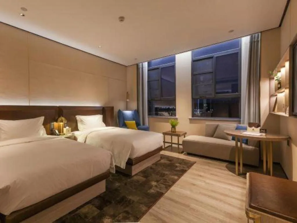 Bed in Echarm Plus Hotel Wuhan Wenhua Boulevard Dahualing Subway Statiom