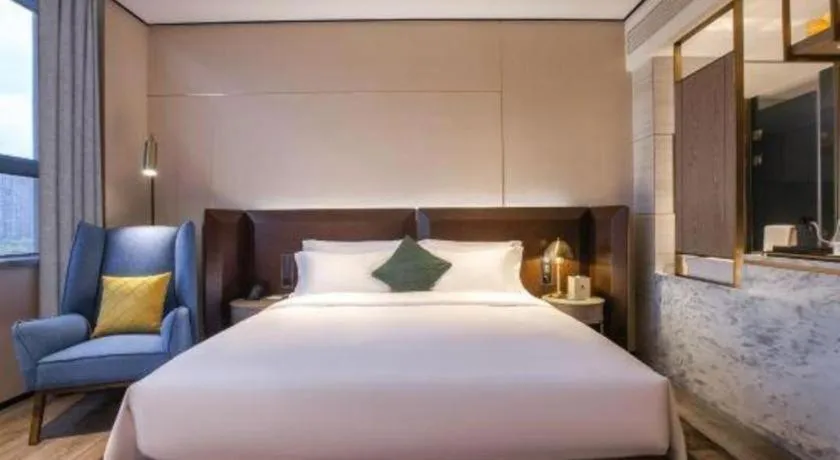 Bed in Echarm Plus Hotel Wuhan Wenhua Boulevard Dahualing Subway Statiom