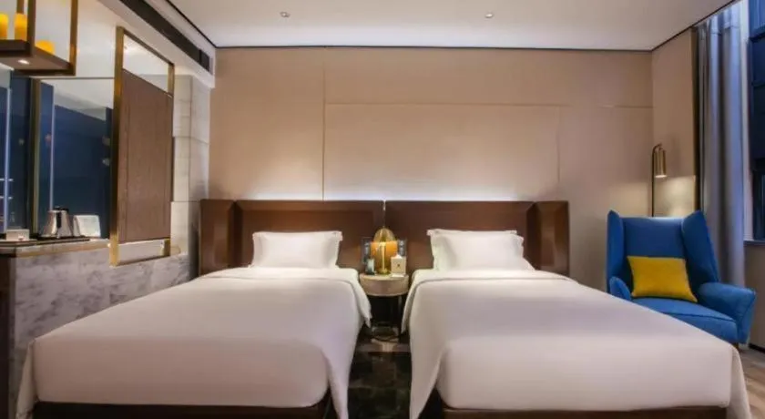 Bed in Echarm Plus Hotel Wuhan Wenhua Boulevard Dahualing Subway Statiom