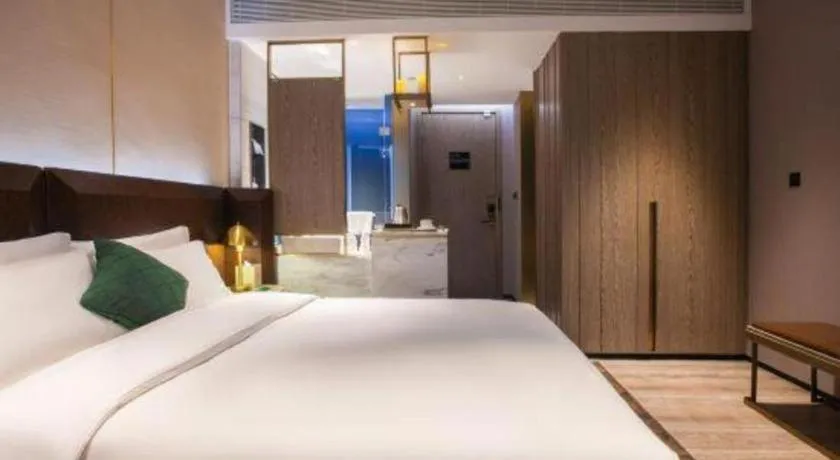 Bed in Echarm Plus Hotel Wuhan Wenhua Boulevard Dahualing Subway Statiom
