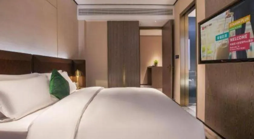 Bed in Echarm Plus Hotel Wuhan Wenhua Boulevard Dahualing Subway Statiom