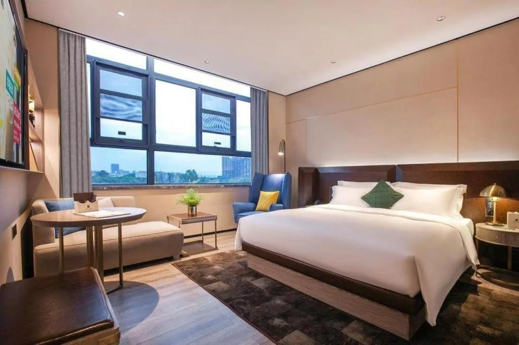 Bed in Echarm Plus Hotel Wuhan Wenhua Boulevard Dahualing Subway Statiom