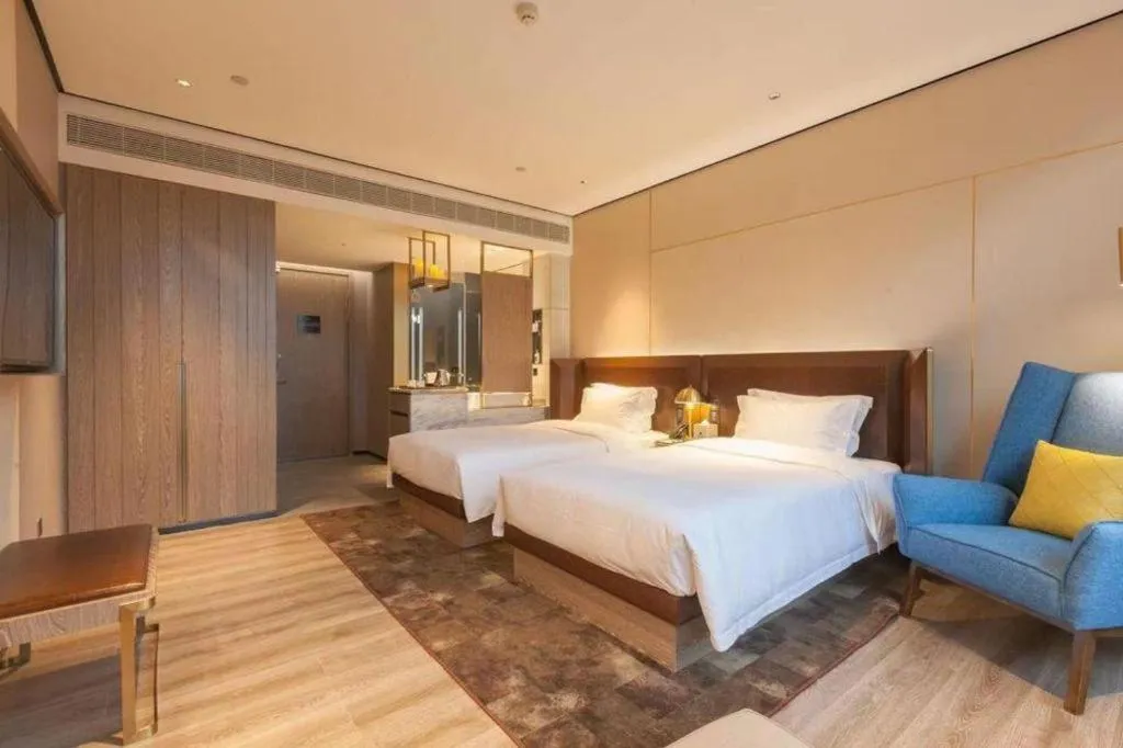 Bed in Echarm Plus Hotel Wuhan Wenhua Boulevard Dahualing Subway Statiom