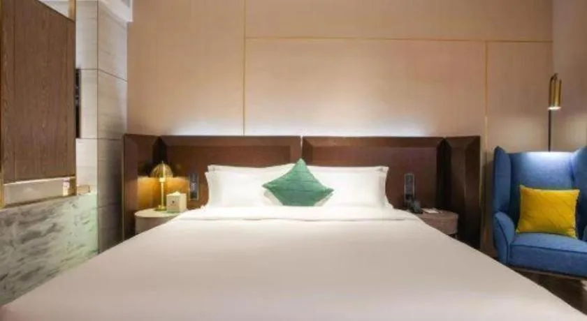 Bed in Echarm Plus Hotel Wuhan Wenhua Boulevard Dahualing Subway Statiom