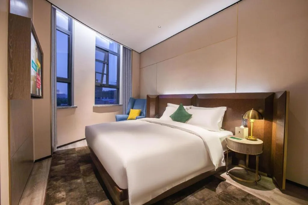 Bed in Echarm Plus Hotel Wuhan Wenhua Boulevard Dahualing Subway Statiom