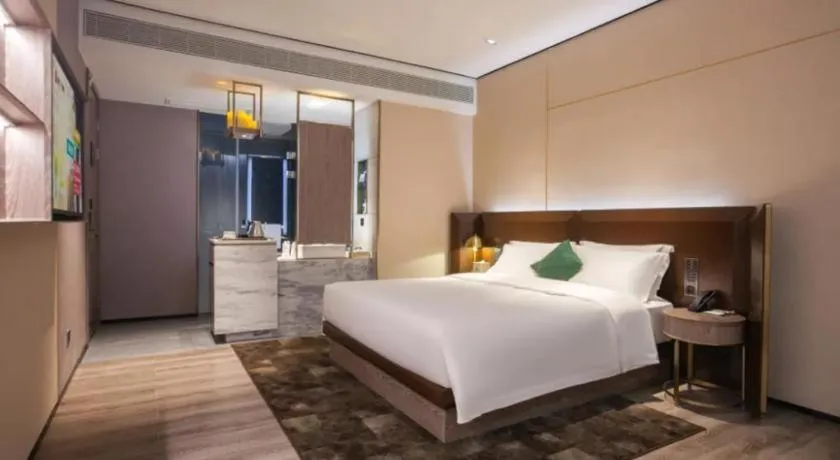 Bed in Echarm Plus Hotel Wuhan Wenhua Boulevard Dahualing Subway Statiom