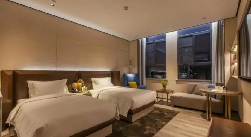 Bed in Echarm Plus Hotel Wuhan Wenhua Boulevard Dahualing Subway Statiom