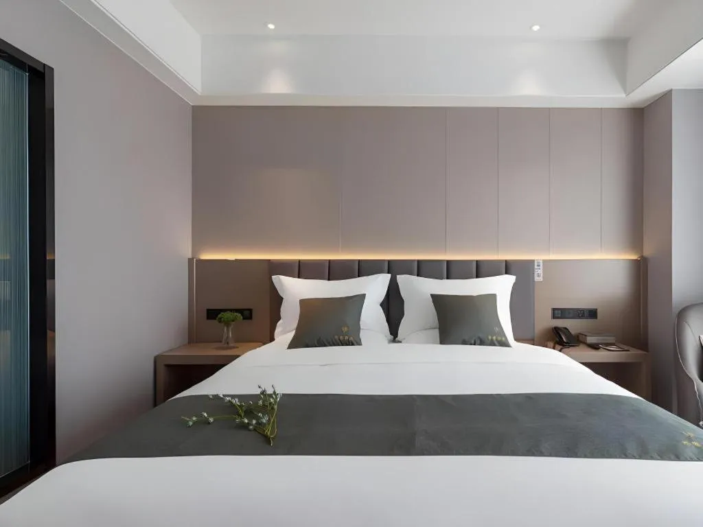 Bed in Gya Hotel Kunming Zijin Center Xiaodongcun Metro Station