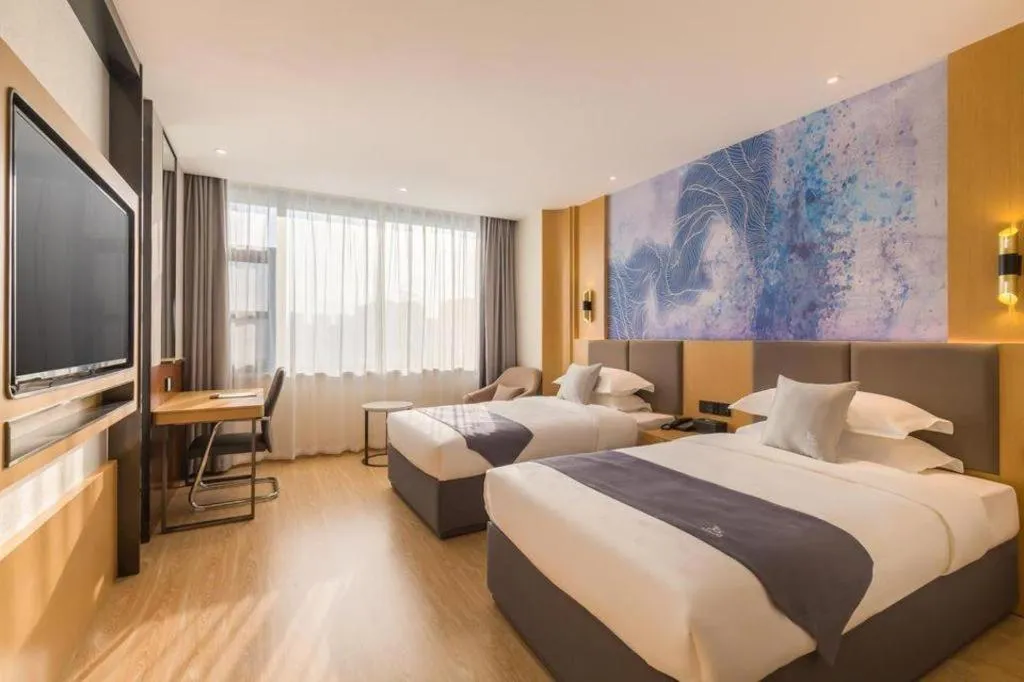 Bed in GreenTree Eastern Hotel Tianjin Dongli Development Zone Xinli Metro Station