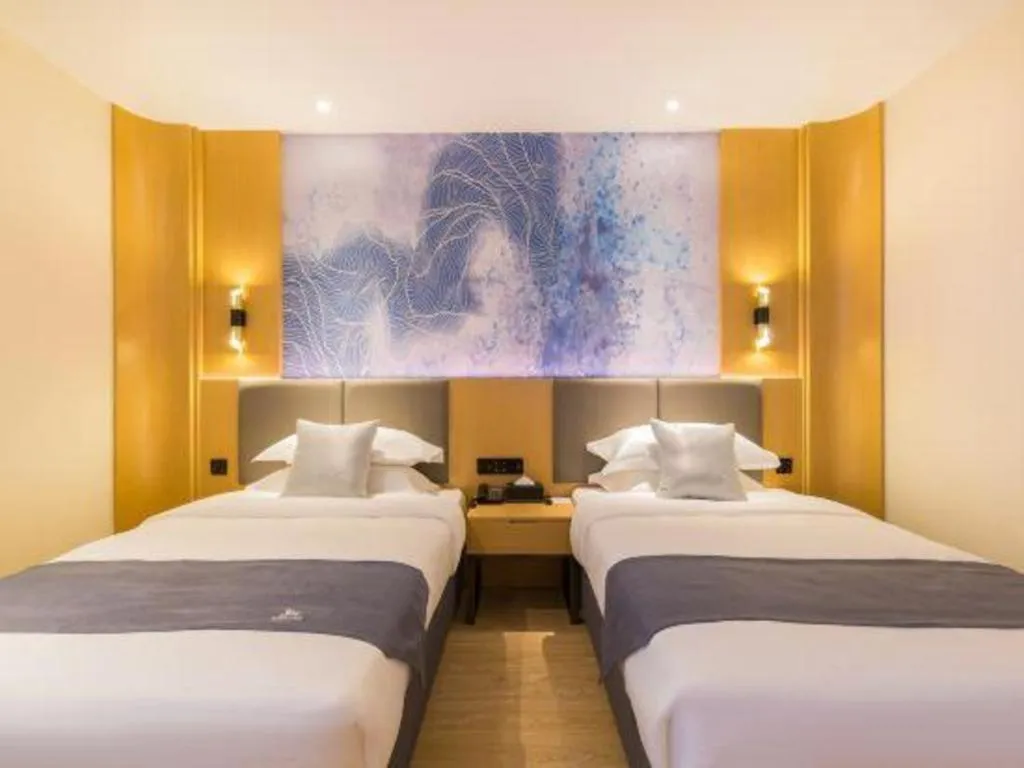 Bed in GreenTree Eastern Hotel Tianjin Dongli Development Zone Xinli Metro Station