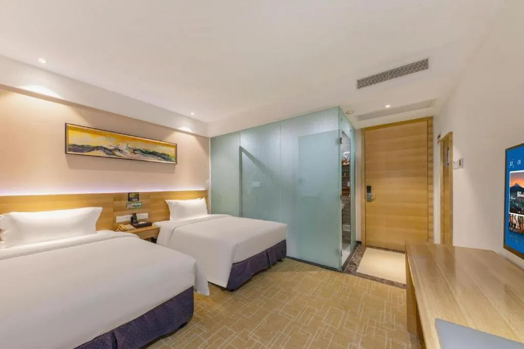 Bed in GreenTree Alliance Hotel Shenzhen Yantian District Dameisha
