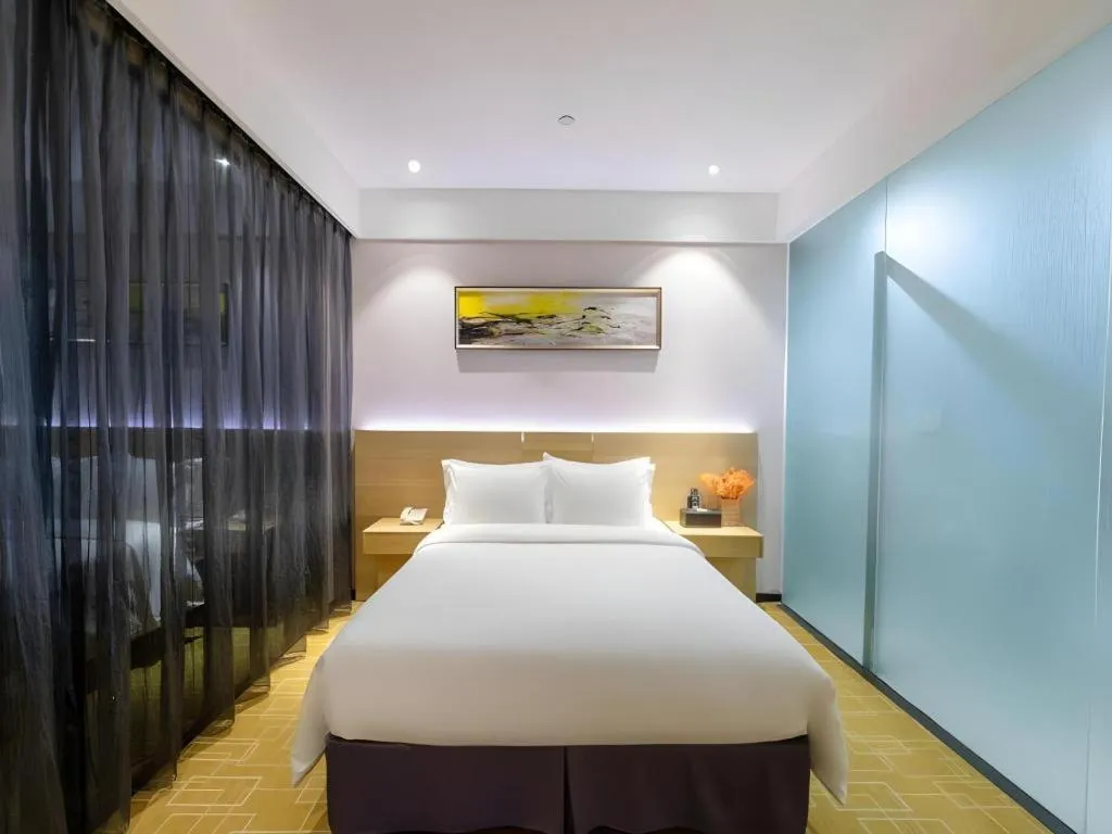 Bed in GreenTree Alliance Hotel Shenzhen Yantian District Dameisha