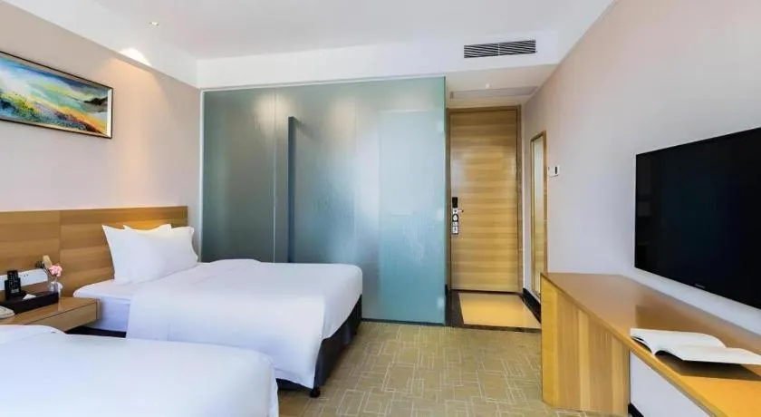 Bed in GreenTree Alliance Hotel Shenzhen Yantian District Dameisha
