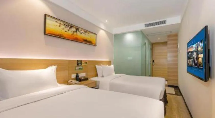 Bed in GreenTree Alliance Hotel Shenzhen Yantian District Dameisha