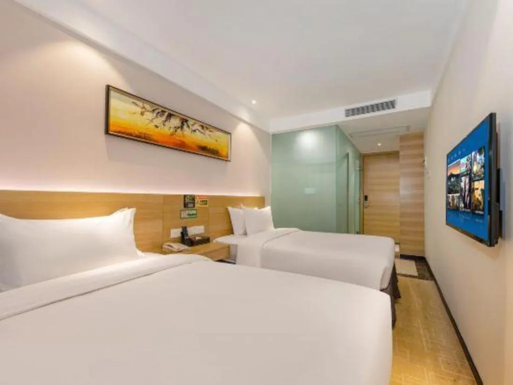 Bed in GreenTree Alliance Hotel Shenzhen Yantian District Dameisha