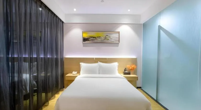 Bed in GreenTree Alliance Hotel Shenzhen Yantian District Dameisha