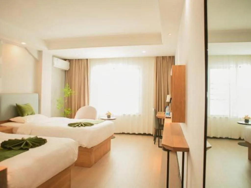 Bed in GreenTree Inn Express Hainan Haikou Haixiu Zhong Road