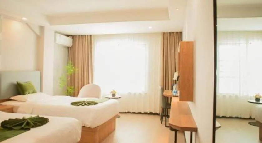 Bed in GreenTree Inn Express Hainan Haikou Haixiu Zhong Road