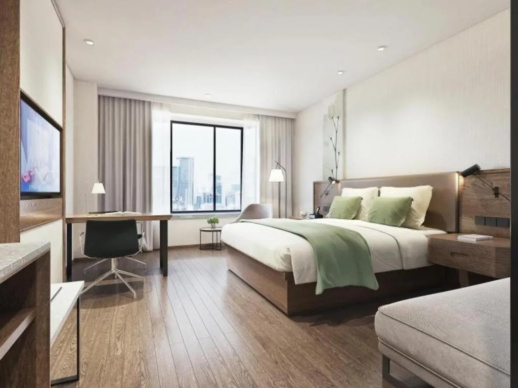 Bed in GreenTree Inn Express Hainan Haikou Haixiu Zhong Road