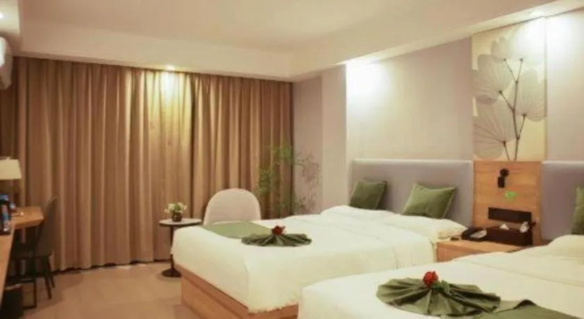 Bed in GreenTree Inn Express Hainan Haikou Haixiu Zhong Road