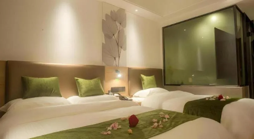 Bed in GreenTree Inn Express Hainan Haikou Haixiu Zhong Road