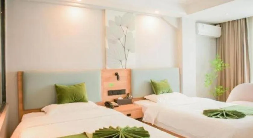 Bed in GreenTree Inn Express Hainan Haikou Haixiu Zhong Road