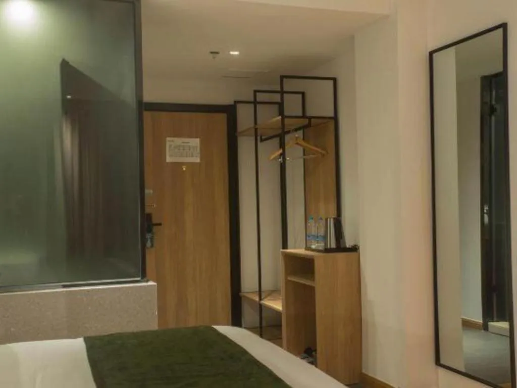 Bed in GreenTree Inn Express Hainan Haikou Haixiu Zhong Road