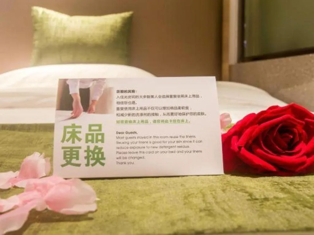 Bed in GreenTree Inn Express Hainan Haikou Haixiu Zhong Road