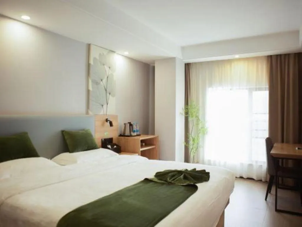 Bed in GreenTree Inn Express Hainan Haikou Haixiu Zhong Road