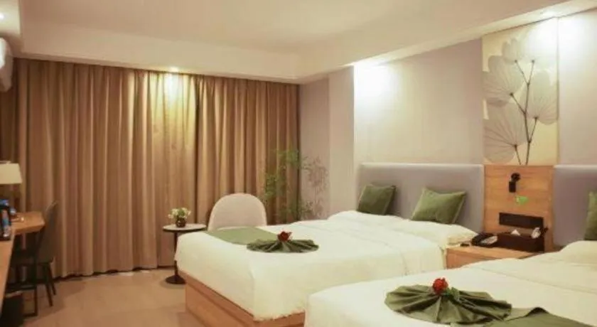 Bed in GreenTree Inn Express Hainan Haikou Haixiu Zhong Road