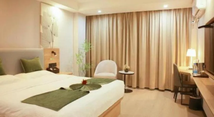 Bed in GreenTree Inn Express Hainan Haikou Haixiu Zhong Road