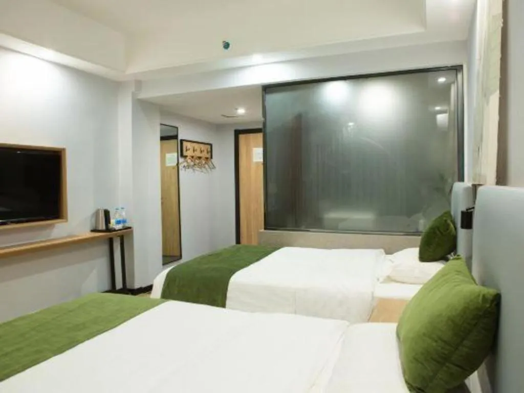 Bed in GreenTree Inn Express Hainan Haikou Haixiu Zhong Road