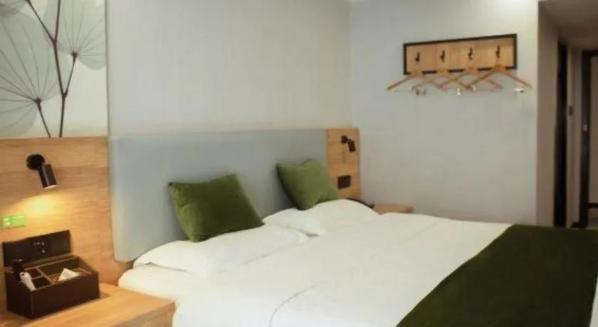 Bed in GreenTree Inn Express Hainan Haikou Haixiu Zhong Road