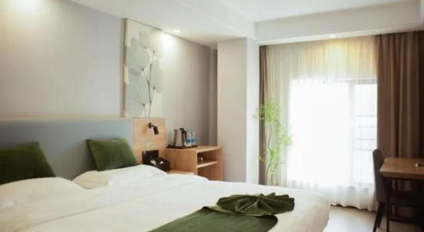 Bed in GreenTree Inn Express Hainan Haikou Haixiu Zhong Road
